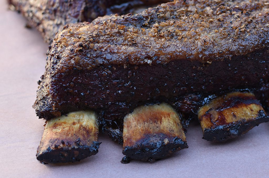Beef ribs cooked, with the bone showing
